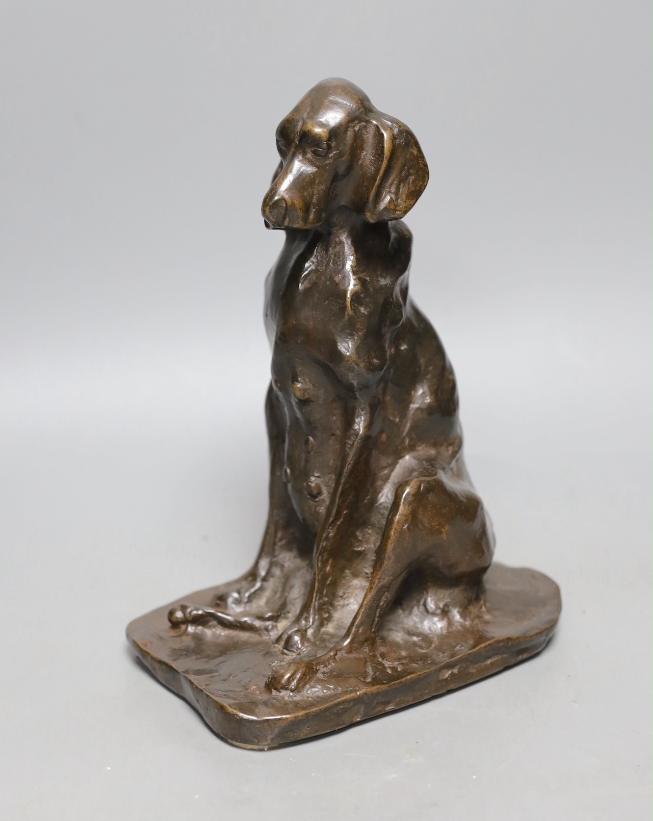 After Prince Paul Troubetzkoy (Russian 1866-1938), a bronze seated figure of a bloodhound bitch, signed. 23cm tall